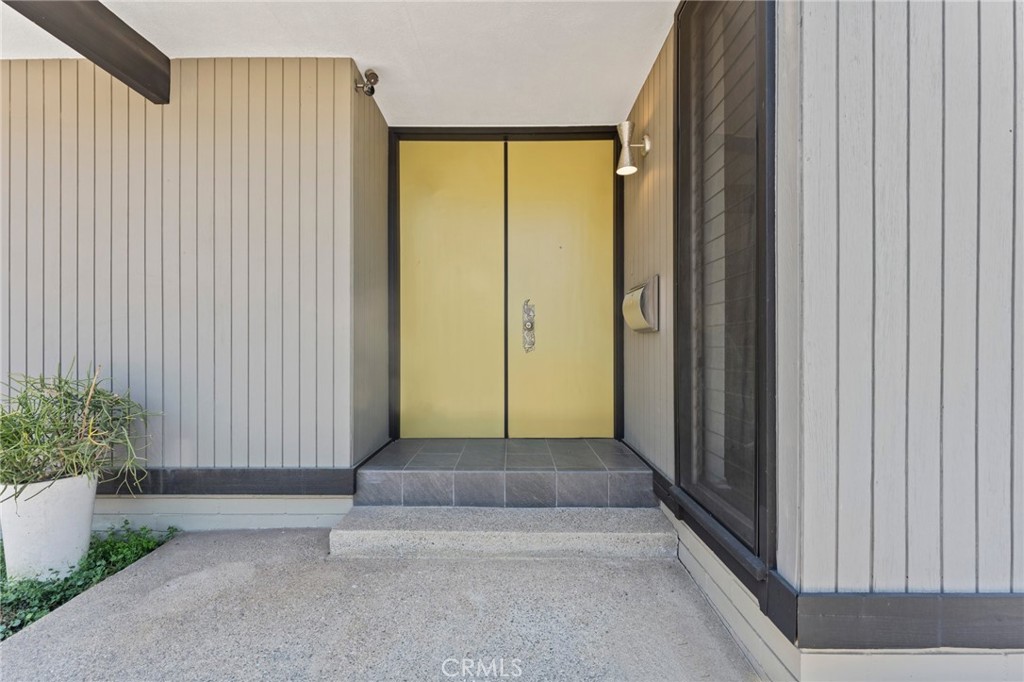 4259 Quail Road Riverside, CA 92507 - Photo 7 of 72 a view of entryway with a wooden door