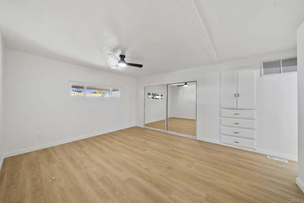 8301 Mission Gorge Road, Unit 253 Santee, CA 92071 - Photo 15 of 40 wooden floor in an empty room