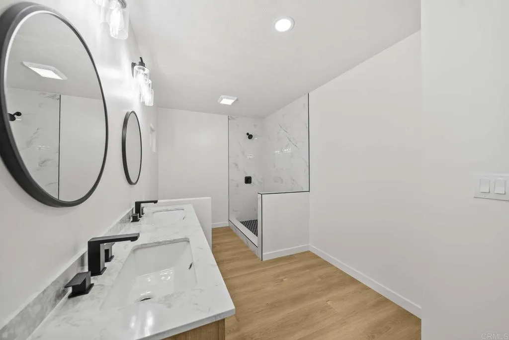 8301 Mission Gorge Road, Unit 253 Santee, CA 92071 - Photo 25 of 40 a view of a kitchen with sink and mirror