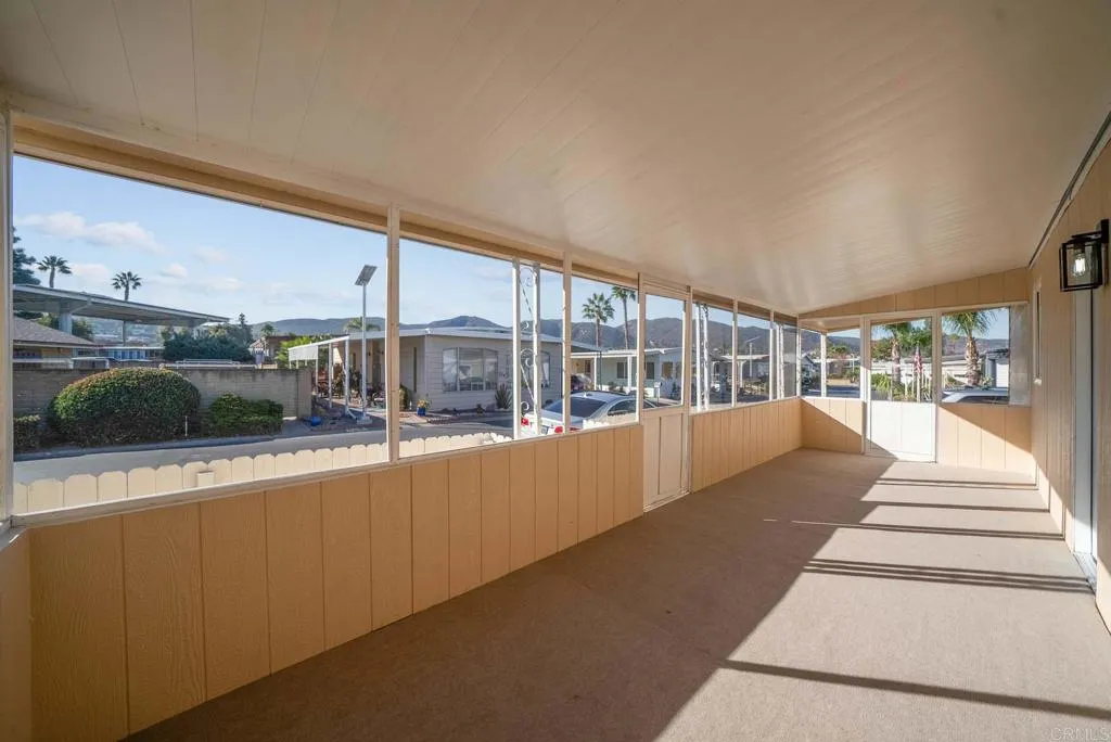 8301 Mission Gorge Road, Unit 253 Santee, CA 92071 - Photo 33 of 40 a swimming pool with outdoor seating and yard