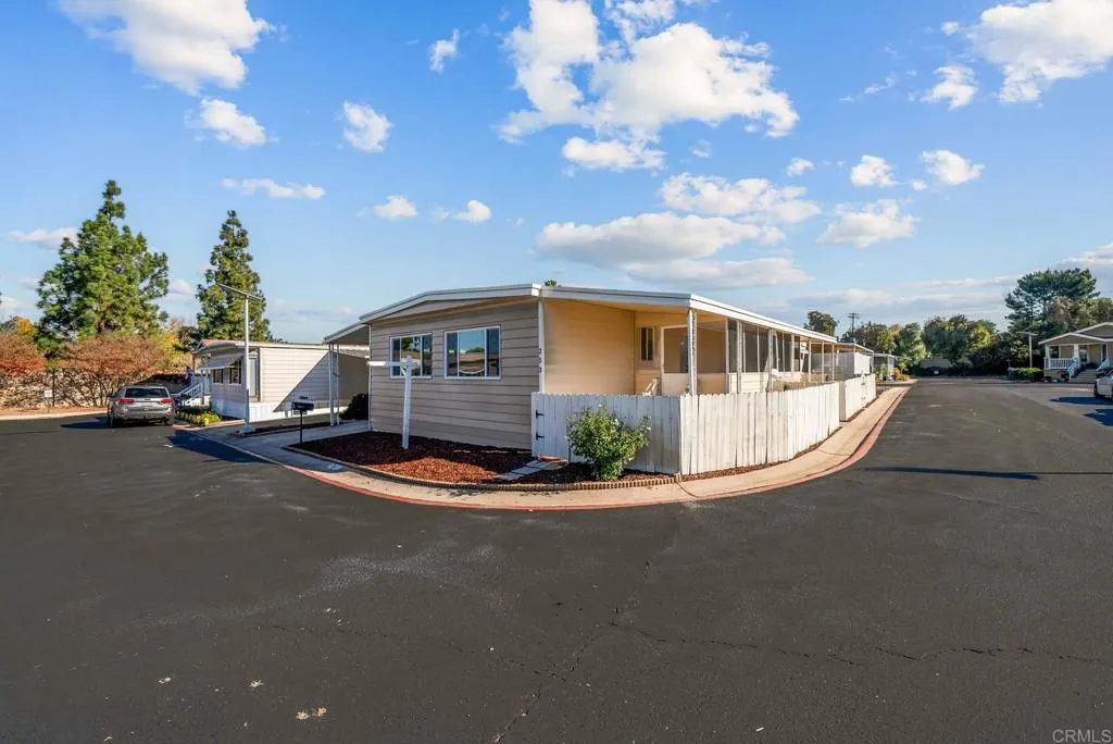 8301 Mission Gorge Road, Unit 253 Santee, CA 92071 - Photo 40 of 40 a front view of a house with a garden