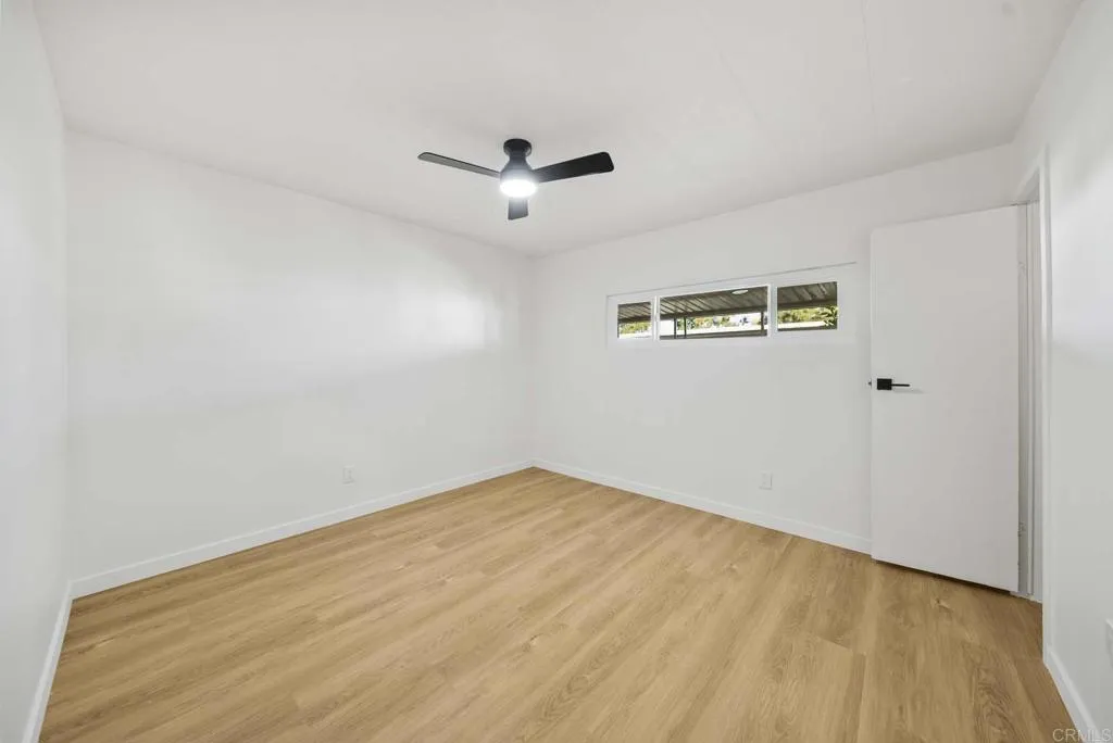 8301 Mission Gorge Road, Unit 253 Santee, CA 92071 - Photo 10 of 40 wooden floor in an empty room