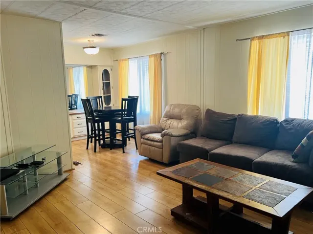 a bedroom with a bed and dresser