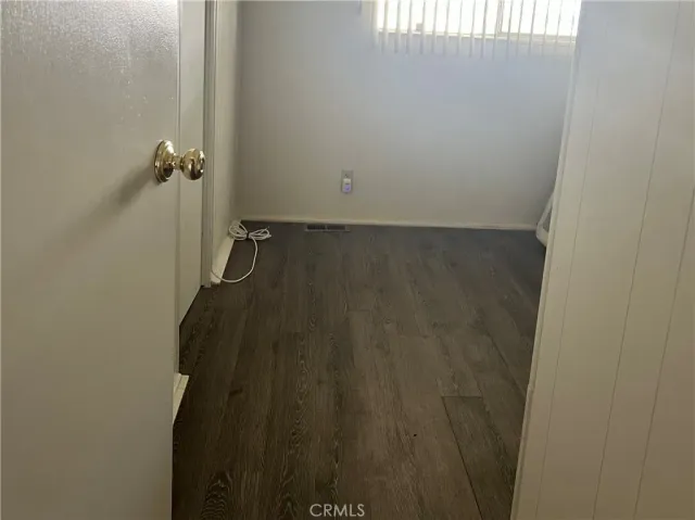 a view of a bathroom from a hallway