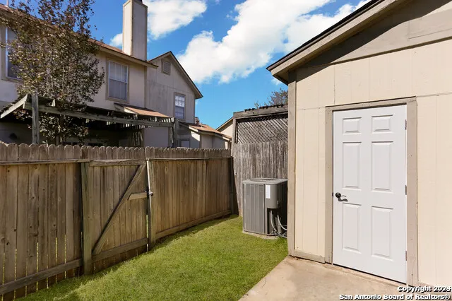 a view of a back yard of the house