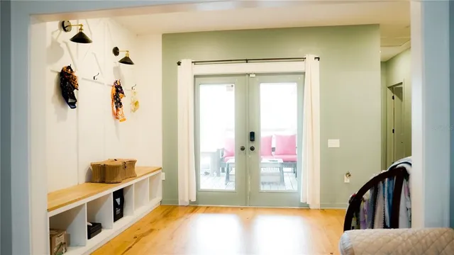a view of a bathroom with a tub and shower