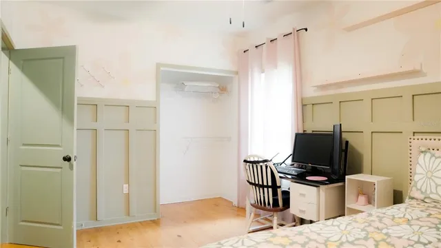 a bedroom with a bed and furniture