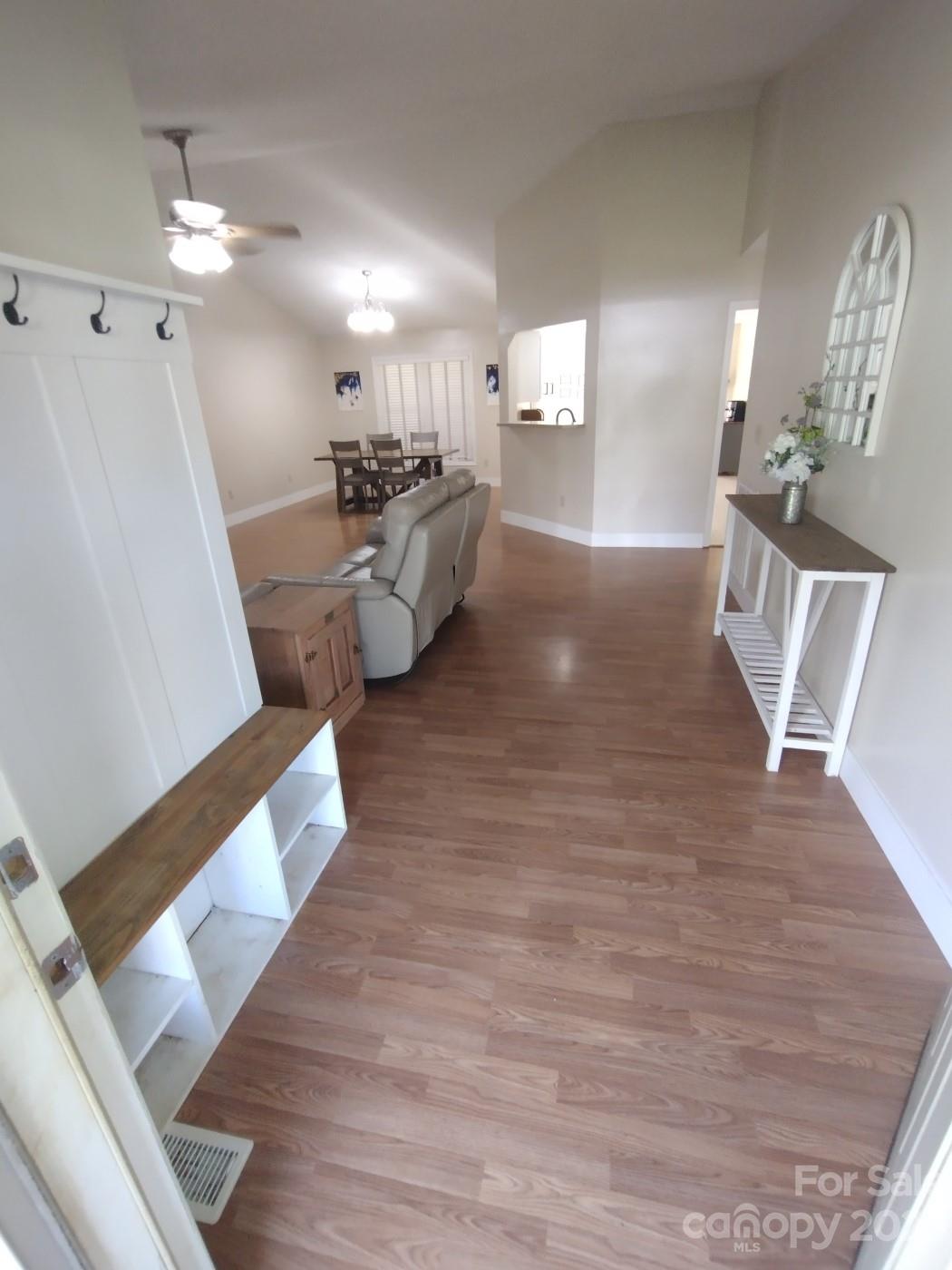 80 South Sunset Ridge Drive Etowah, NC 28729 - Photo 2 of 48 a living room with furniture and a wooden floor