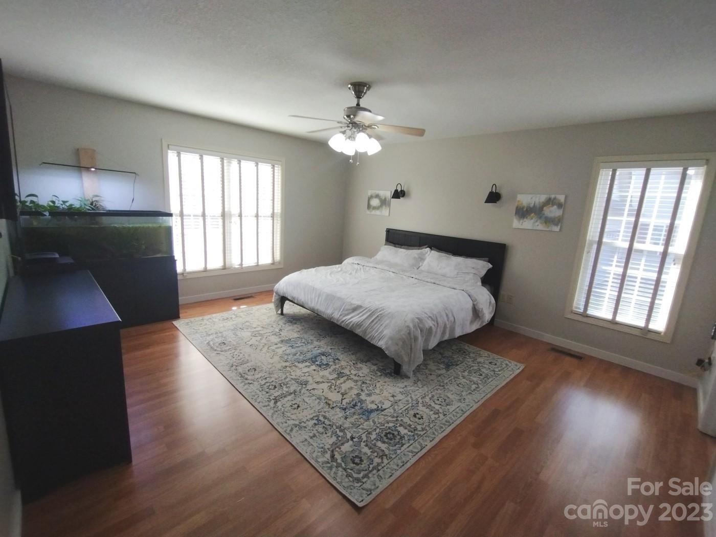 80 South Sunset Ridge Drive Etowah, NC 28729 - Photo 24 of 48 a bedroom with a bed and a window