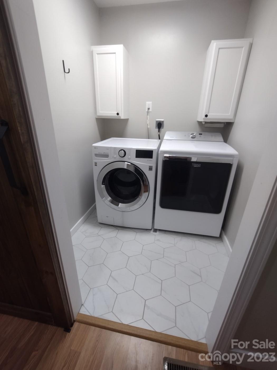 80 South Sunset Ridge Drive Etowah, NC 28729 - Photo 30 of 48 a utility room with dryer and washer