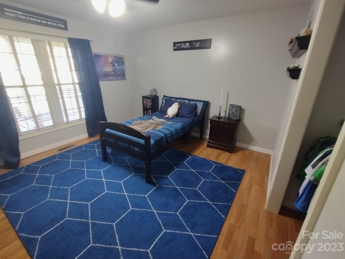 80 South Sunset Ridge Drive Etowah, NC 28729 - Photo 32 of 48 a living room with furniture and a rug