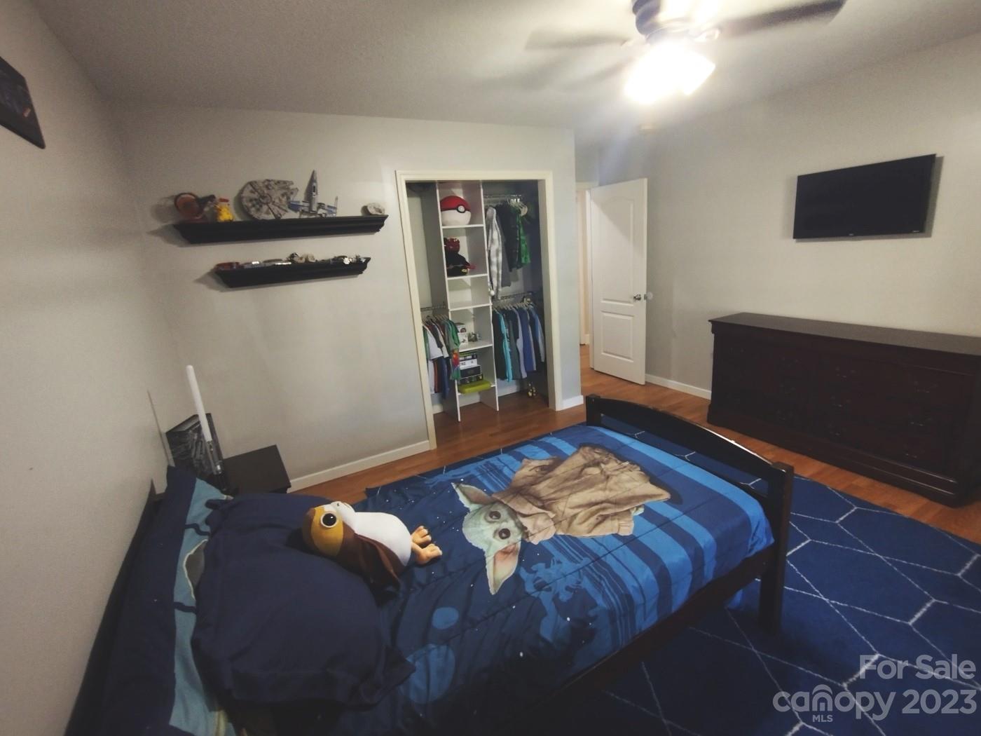 80 South Sunset Ridge Drive Etowah, NC 28729 - Photo 33 of 48 a bedroom with bed and a window