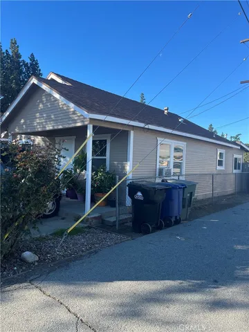 front view of a house and a yard