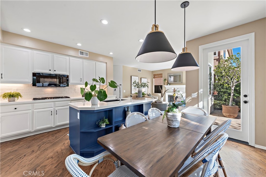 16 Clermont Newport Coast, CA 92657 - Photo 12 of 29 a view of a dining room with furniture window and wooden floor