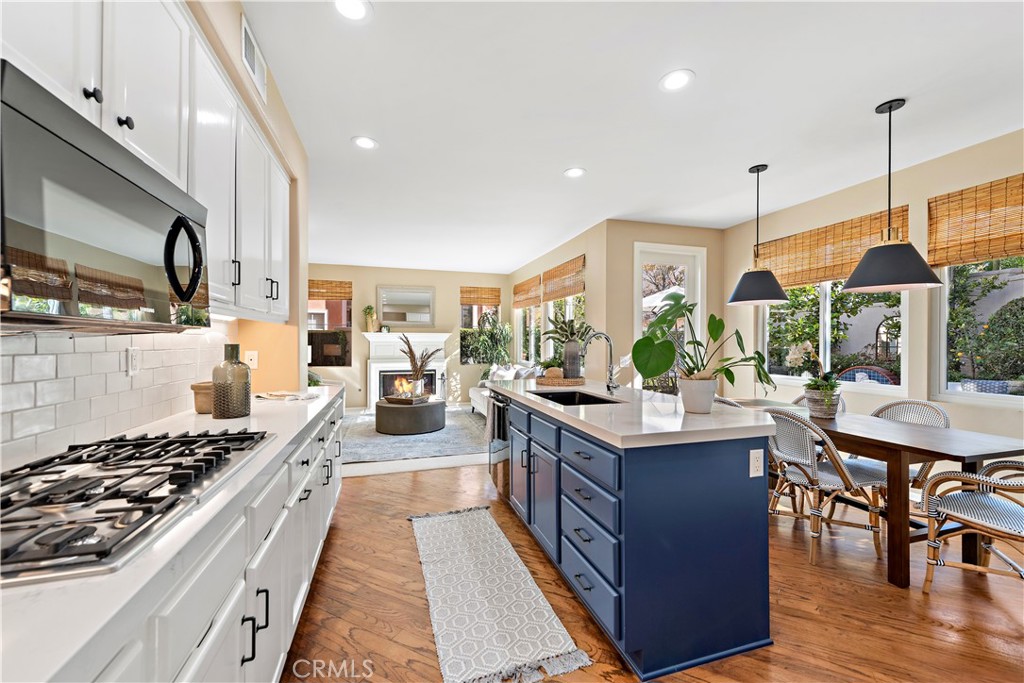 16 Clermont Newport Coast, CA 92657 - Photo 13 of 29 a kitchen with stainless steel appliances granite countertop a stove a sink dishwasher and a flat tv screen
