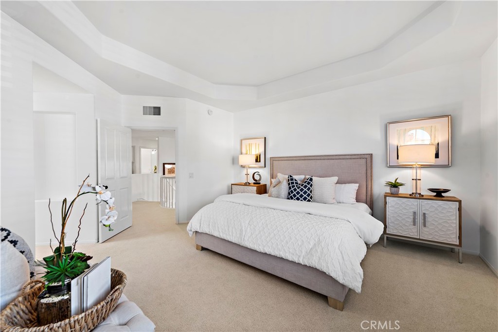 16 Clermont Newport Coast, CA 92657 - Photo 22 of 29 a bedroom with a bed and a potted plant