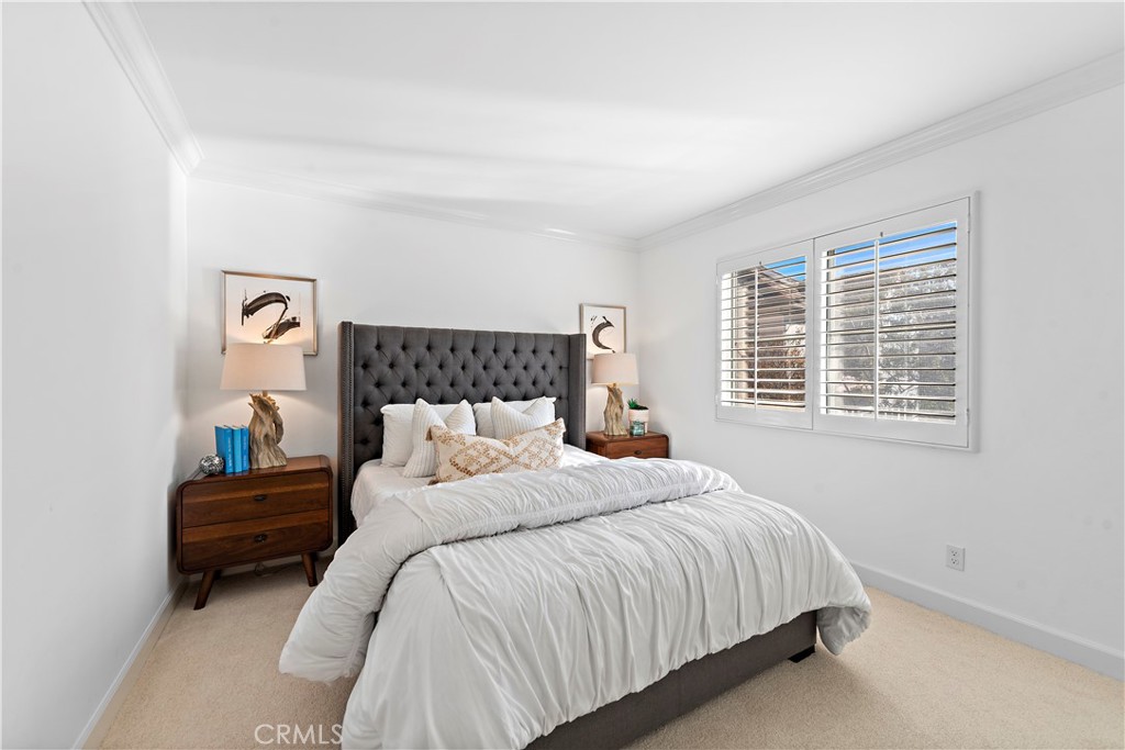 16 Clermont Newport Coast, CA 92657 - Photo 26 of 29 a bedroom with a bed and a window