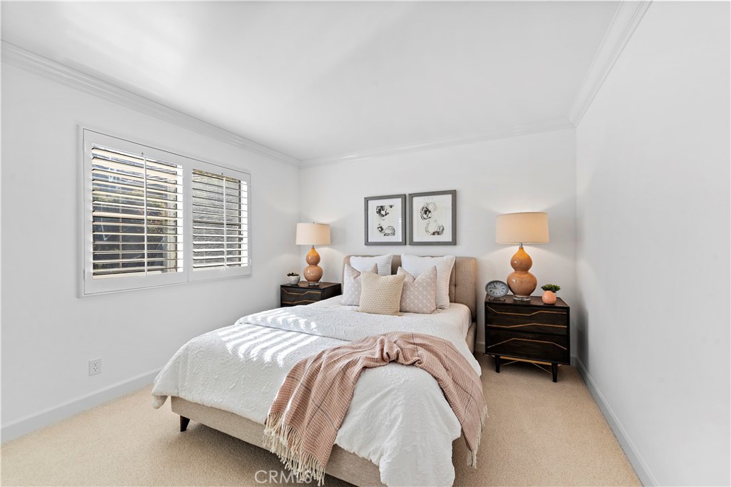 16 Clermont Newport Coast, CA 92657 - Photo 27 of 29 a bedroom with a bed and a window