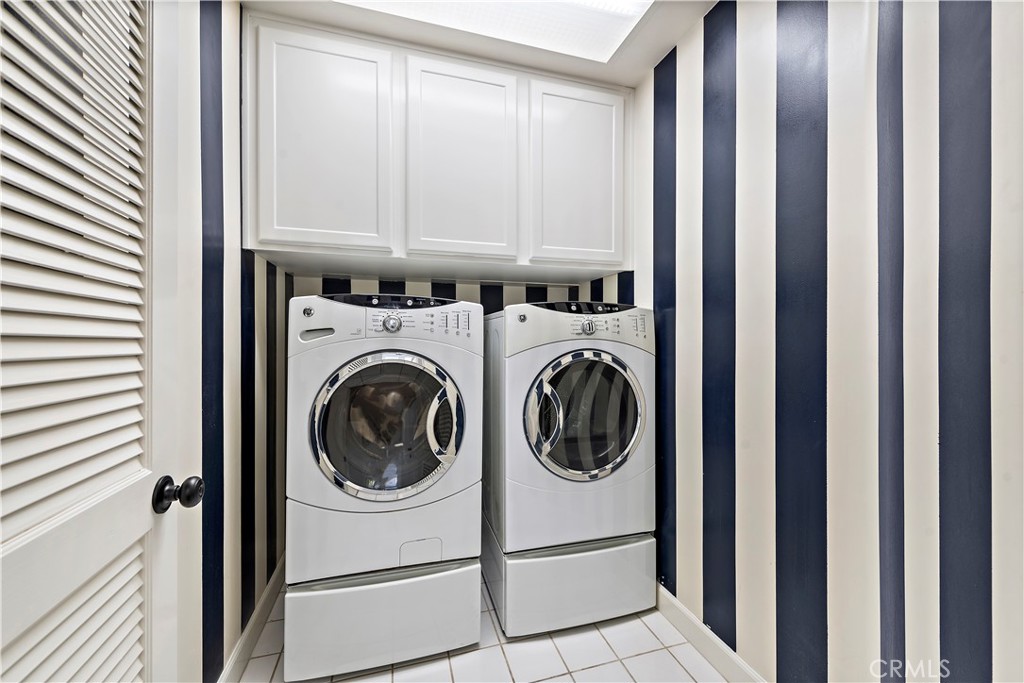 16 Clermont Newport Coast, CA 92657 - Photo 29 of 29 a utility room with dryer and washer