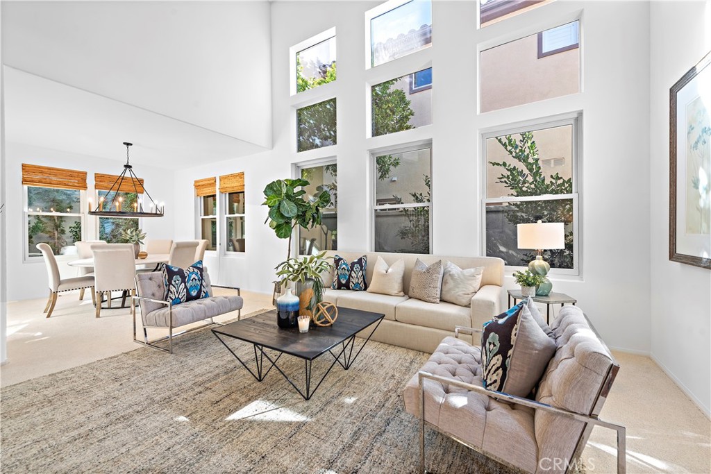 16 Clermont Newport Coast, CA 92657 - Photo 3 of 29 a living room with furniture and a large window