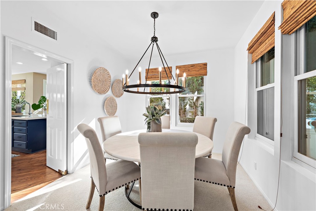 16 Clermont Newport Coast, CA 92657 - Photo 5 of 29 a view of a dining room with furniture window and wooden floor