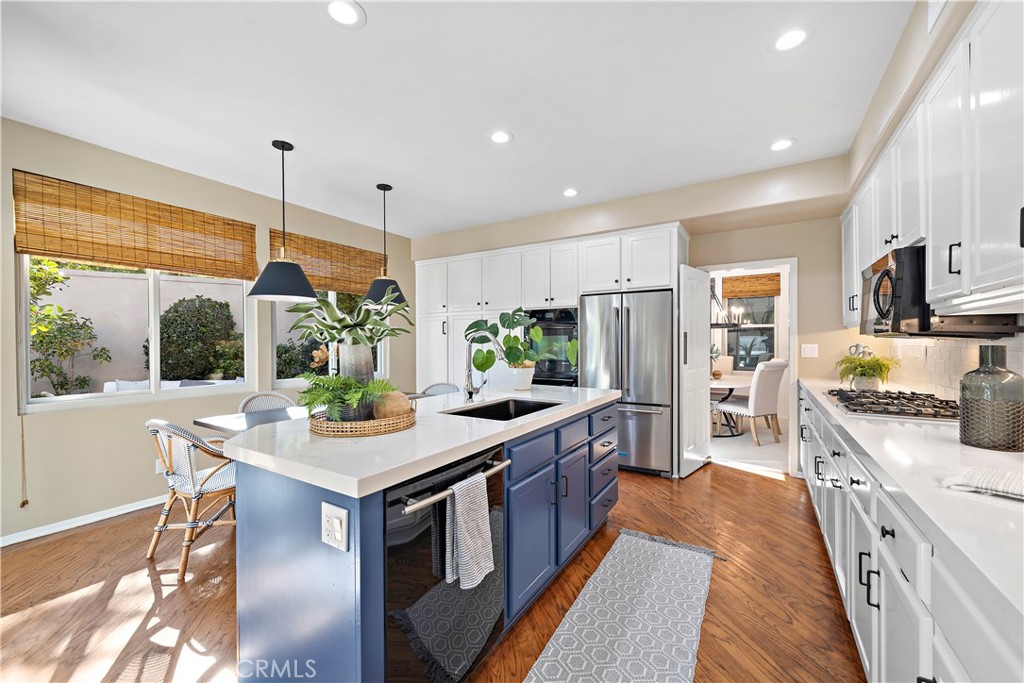 16 Clermont Newport Coast, CA 92657 - Photo 10 of 29 a kitchen with stainless steel appliances granite countertop a stove oven and a refrigerator