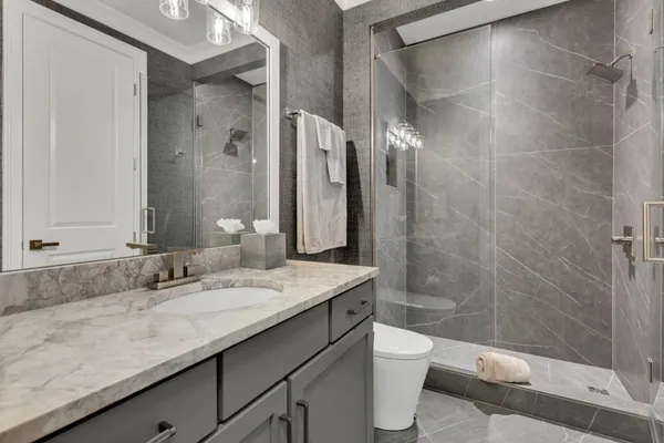 a view of a livingroom with furniture and wooden floor