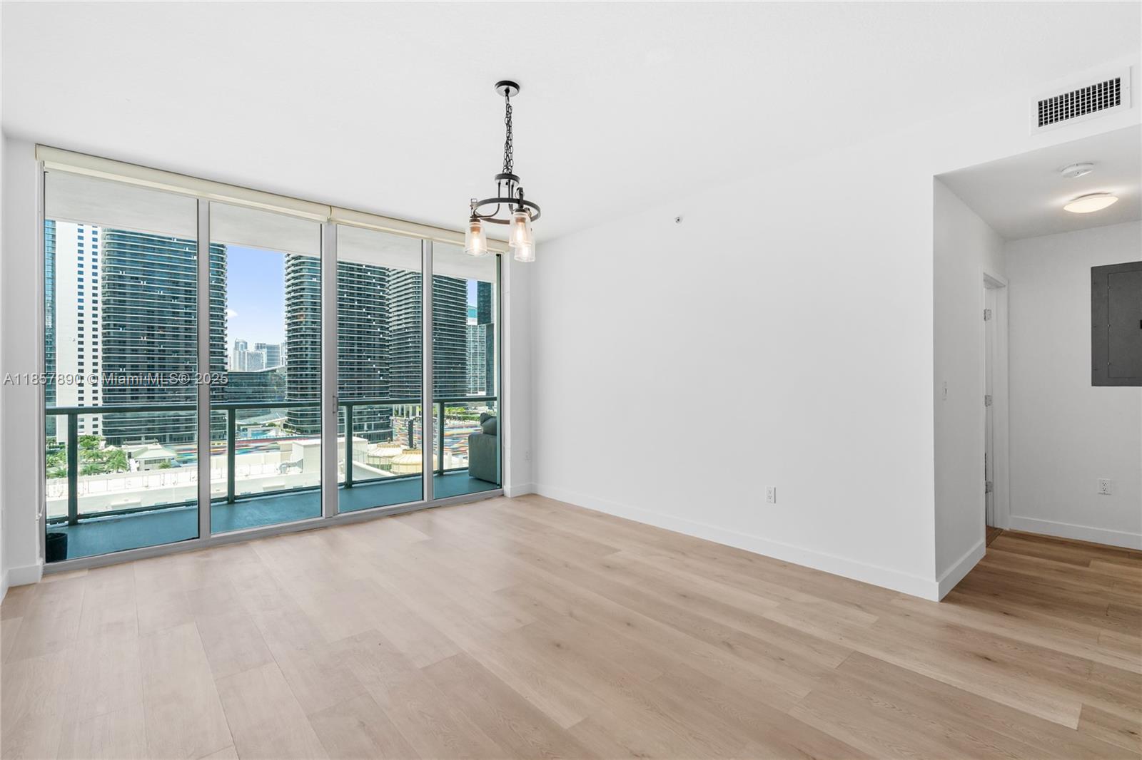 1111 Southwest 1st Avenue, Unit 2222N Miami, FL 33130 - Photo 12 of 53 a view of an empty room with windows