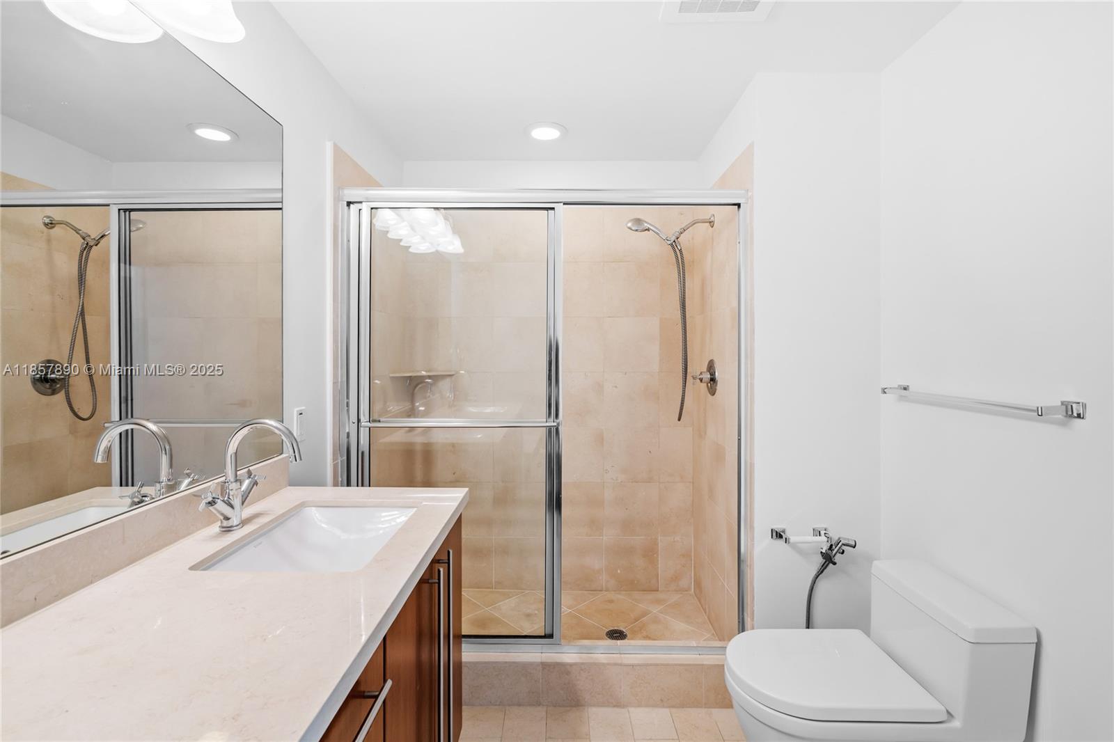 1111 Southwest 1st Avenue, Unit 2222N Miami, FL 33130 - Photo 22 of 53 a bathroom with a sink toilet and shower