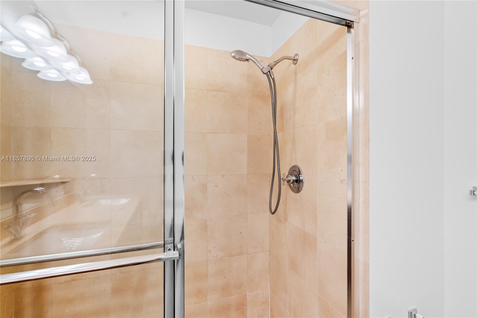 1111 Southwest 1st Avenue, Unit 2222N Miami, FL 33130 - Photo 23 of 53 a bathroom with a shower