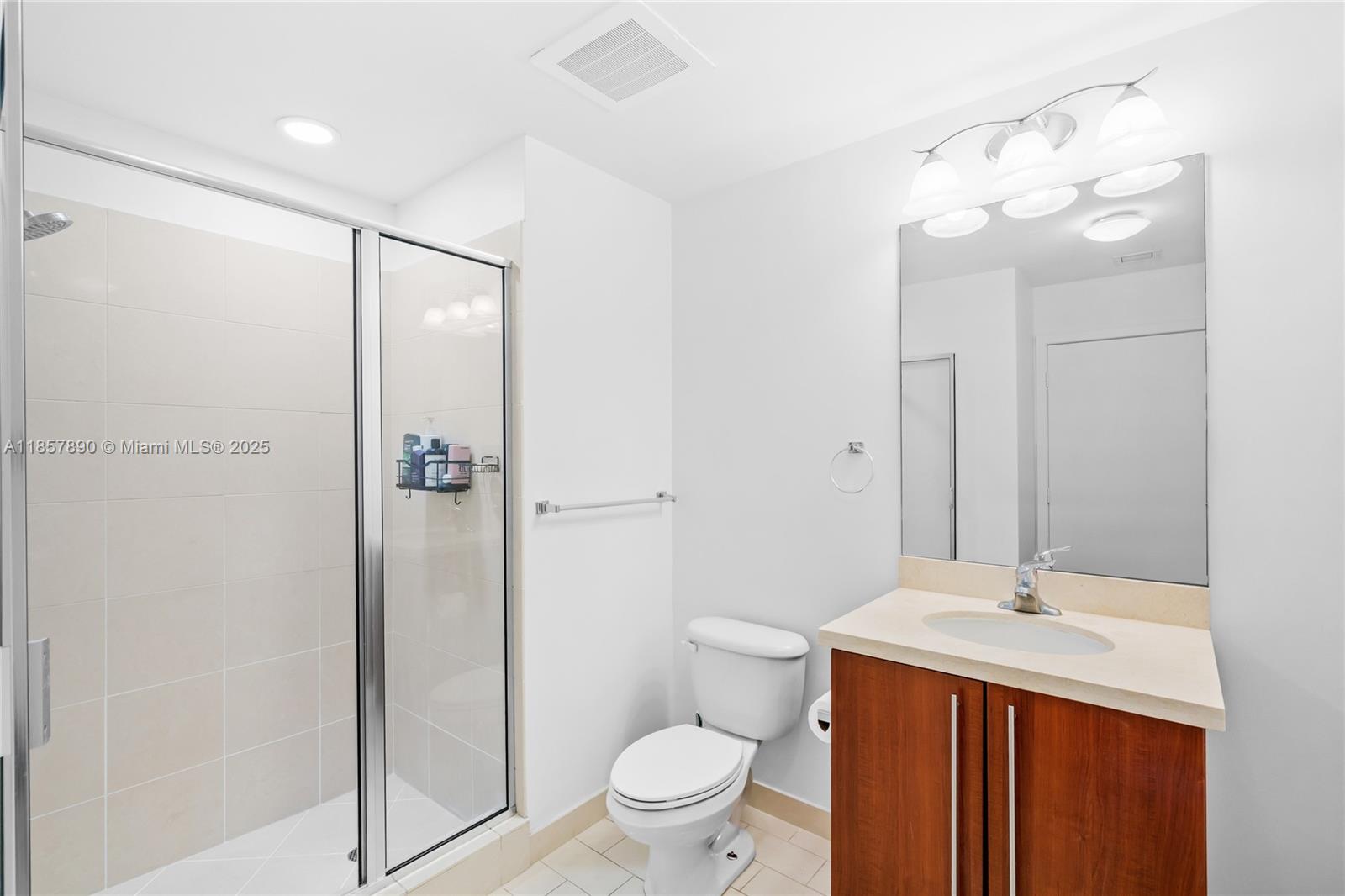 1111 Southwest 1st Avenue, Unit 2222N Miami, FL 33130 - Photo 28 of 53 a bathroom with a sink a toilet and shower