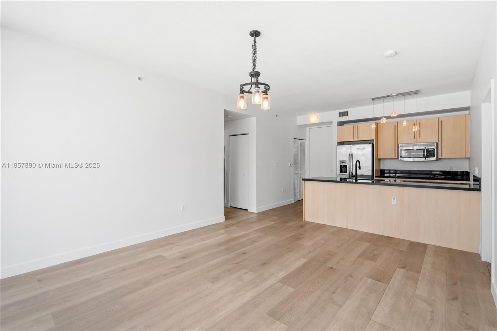 1111 Southwest 1st Avenue, Unit 2222N Miami, FL 33130 - Photo 8 of 53 a view of a kitchen with a sink and dishwasher