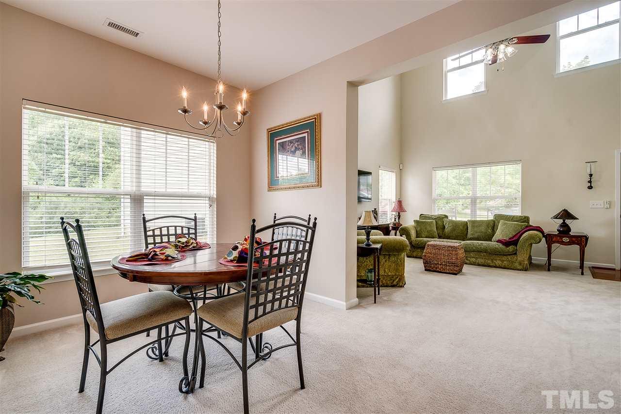 3504 Pinkham Way Raleigh, NC 27616 - Photo 8 of 24 a view of a dining room with furniture window and outside view