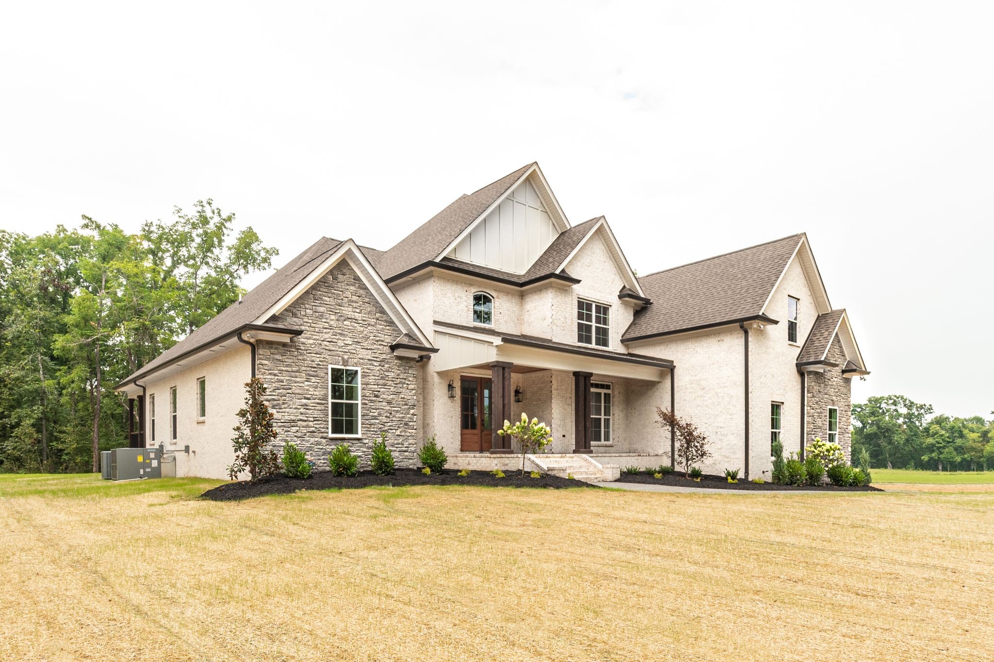 1635 Phillips Road Lebanon, TN 37087 - Photo 3 of 40 a front view of a house with a yard and garage