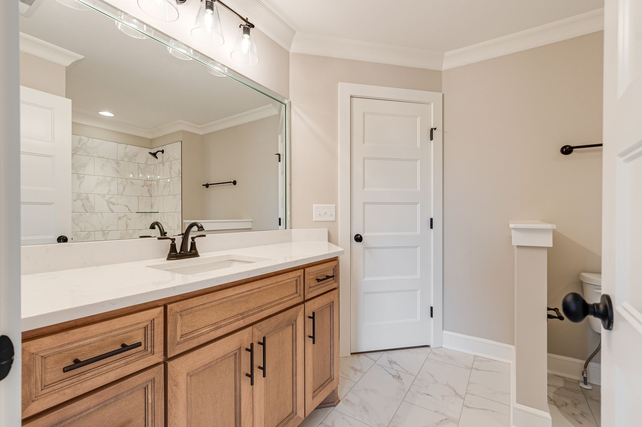 1635 Phillips Road Lebanon, TN 37087 - Photo 36 of 40 a spacious bathroom with a sink and a mirror