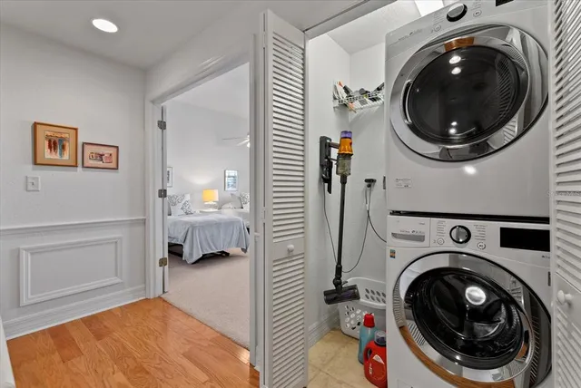 a view of a hallway with washer and dryer