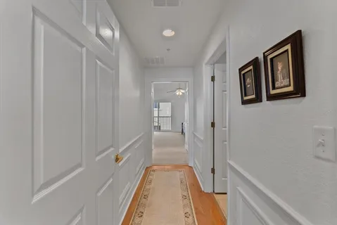 a view of a hallway with closet