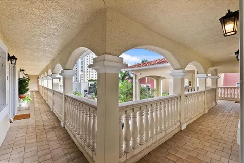 a view of a porch with two windows