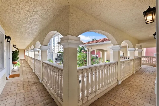 a view of a porch with two windows