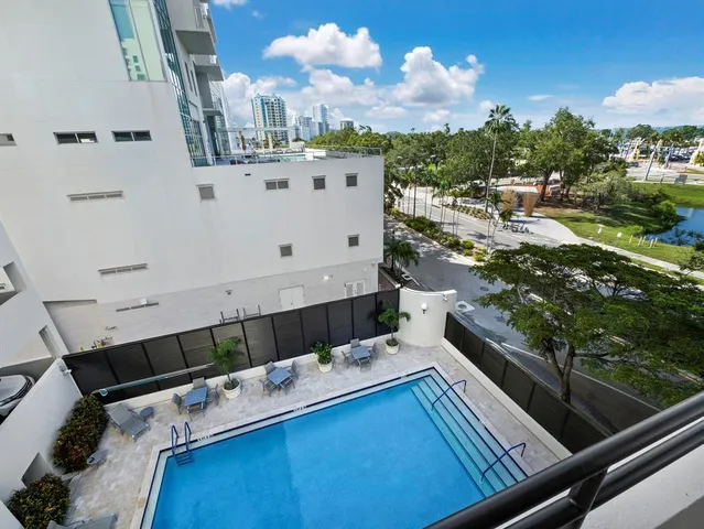 a view of balcony with furniture