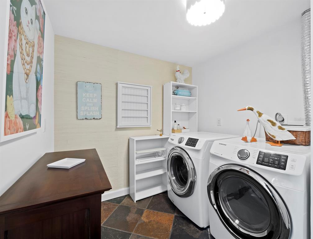 1255 North Gulfstream Avenue, Unit 408 Sarasota, FL 34236 - Photo 25 of 35 a view of entryway with washer and dryer