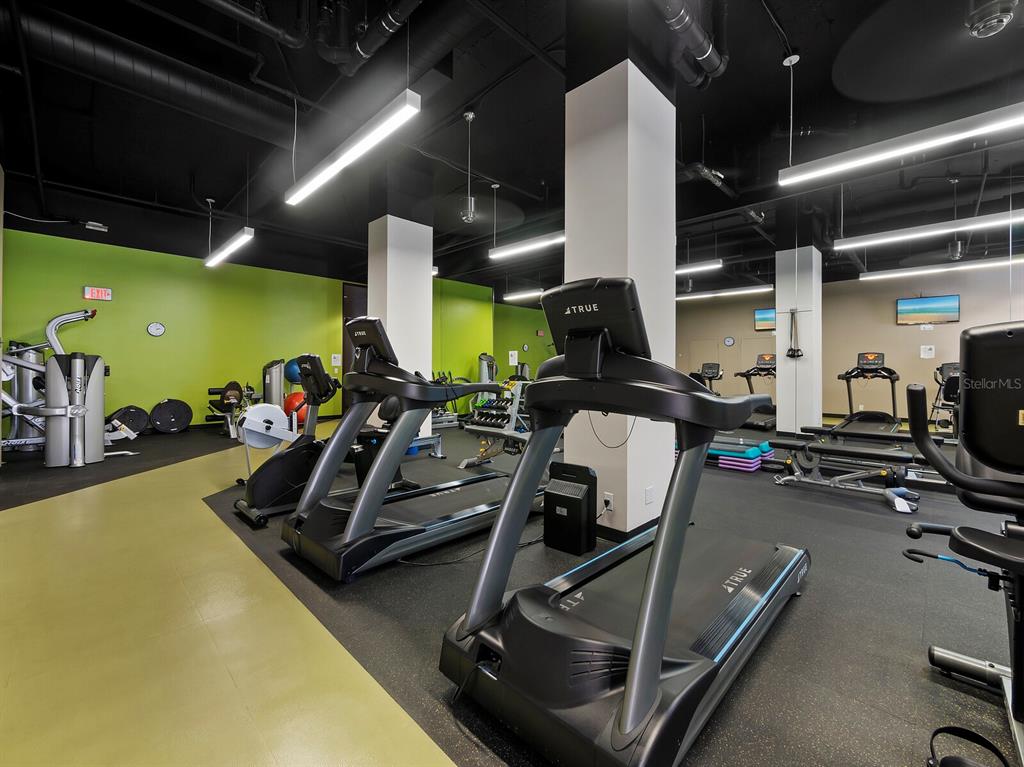 1255 North Gulfstream Avenue, Unit 408 Sarasota, FL 34236 - Photo 31 of 35 a room with gym equipment