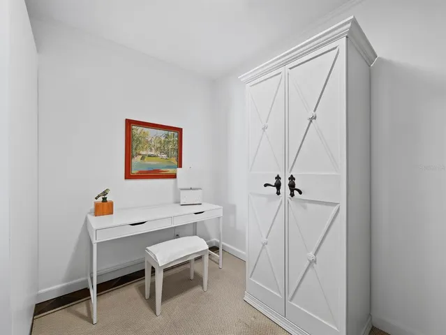 a room with a table and workspace