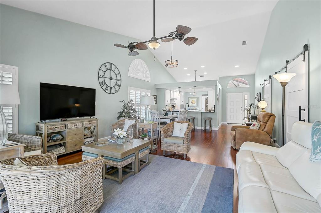 4934 Clubview Court East Bradenton, FL 34203 - Photo 13 of 44 a living room with furniture and a flat screen tv