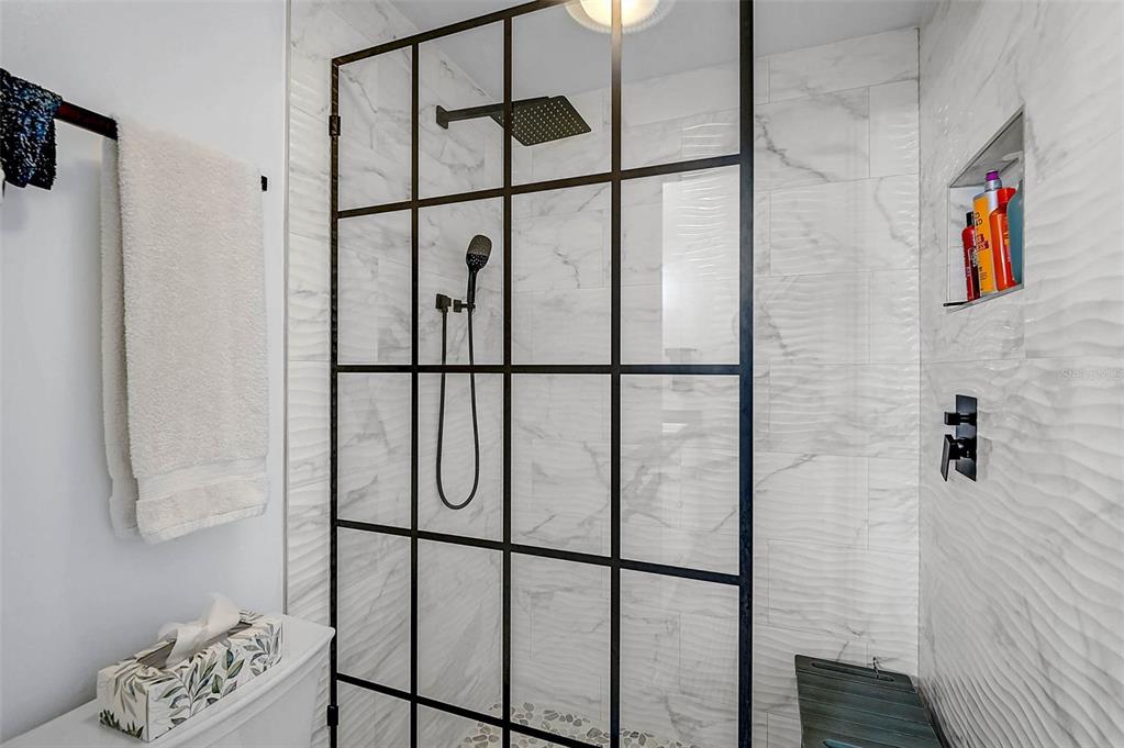 4934 Clubview Court East Bradenton, FL 34203 - Photo 20 of 44 a bathroom with a shower