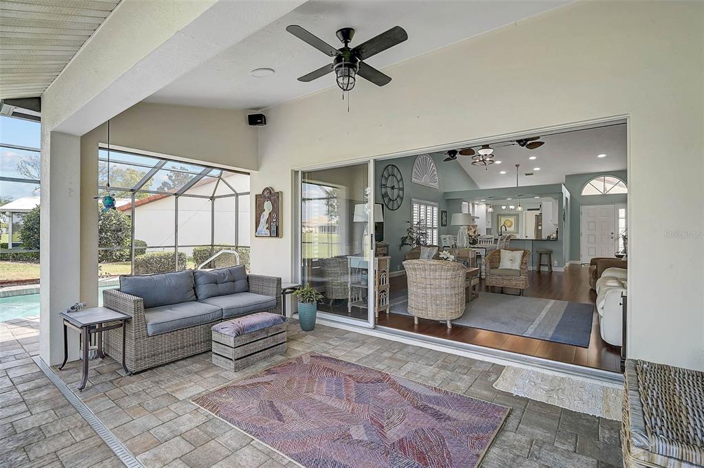 4934 Clubview Court East Bradenton, FL 34203 - Photo 27 of 44 a living room with furniture and a large window