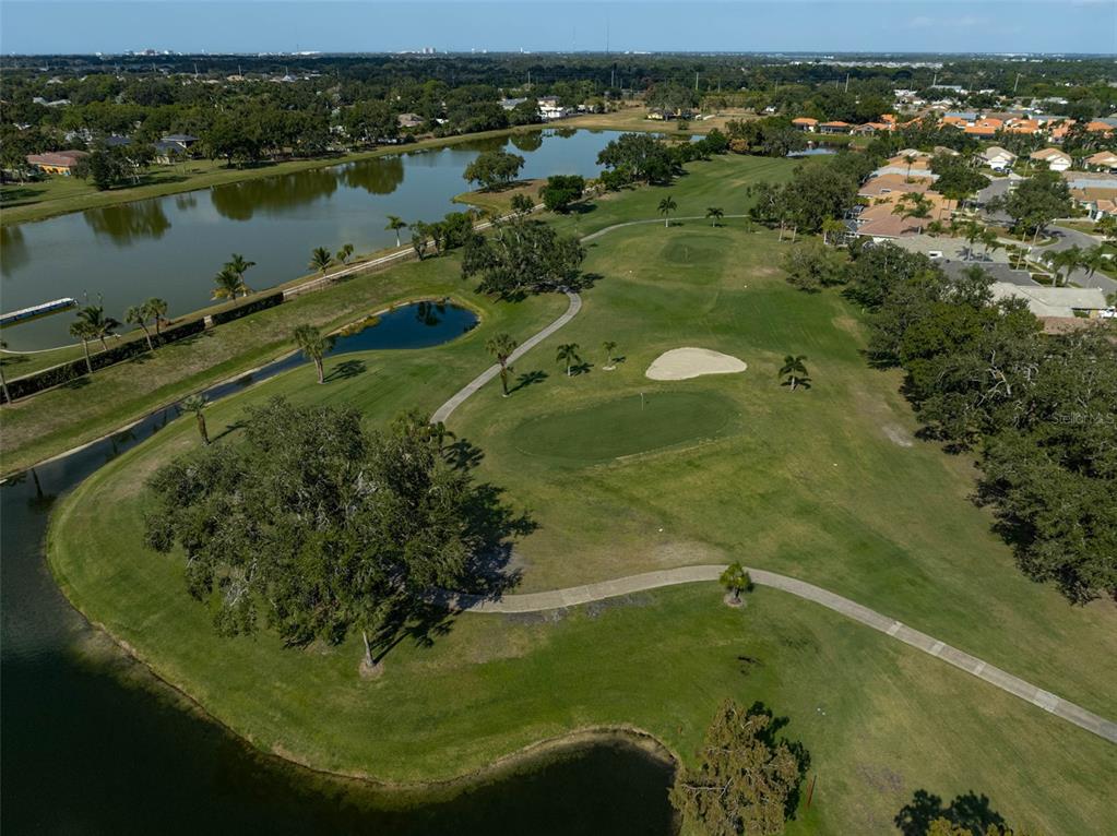 4934 Clubview Court East Bradenton, FL 34203 - Photo 38 of 44 an aerial view of a house with a yard