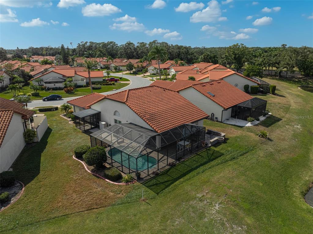 4934 Clubview Court East Bradenton, FL 34203 - Photo 41 of 44 an aerial view of a house with a yard basket ball court and outdoor seating