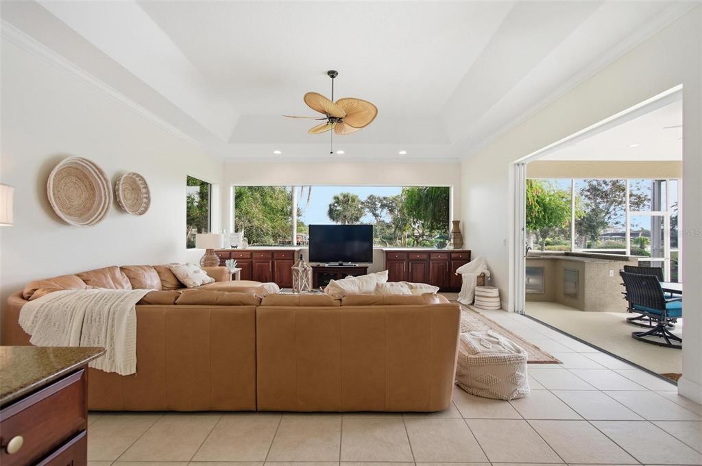 83 Front Street Palm Coast, FL 32137 - Photo 30 of 100 a living room with furniture and a large window