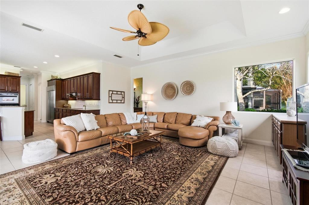 83 Front Street Palm Coast, FL 32137 - Photo 31 of 100 a living room with furniture and a large window